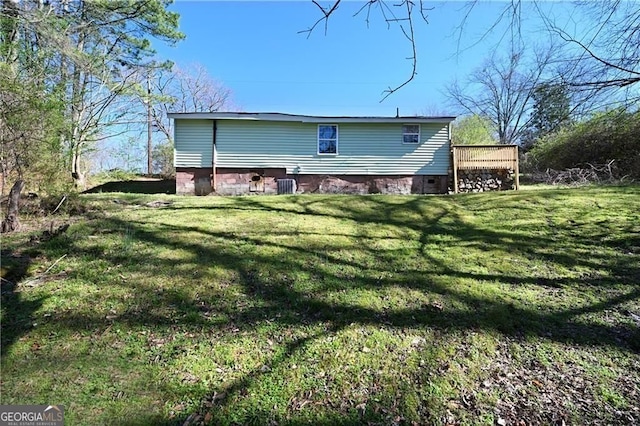 6886 Upshaw Mill Rd, Douglasville, GA 30134 - back of property with a lawn and crawl space