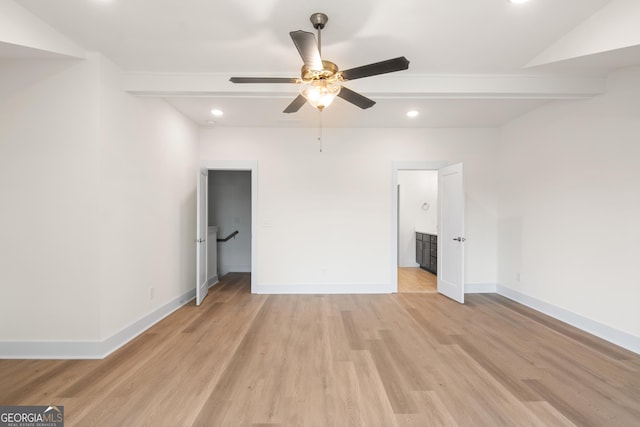 2219 Nena Way Unit 22, Tucker, GA 30084 - unfurnished room with light wood finished floors, beamed ceiling, baseboards, and a ceiling fan