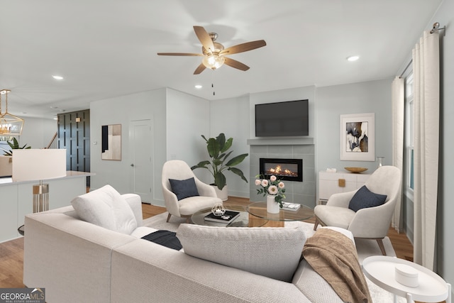 2219 Nena Way Unit 22, Tucker, GA 30084 - living room with a ceiling fan, a tiled fireplace, recessed lighting, and light wood-style floors
