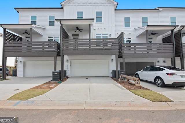2219 Nena Way Unit 22, Tucker, GA 30084 - view of property with a garage, board and batten siding, ceiling fan, and driveway