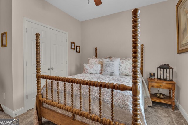 bedroom featuring carpet flooring, baseboards, a closet, and ceiling fan