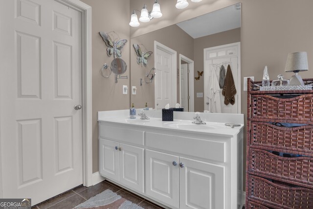 full bath with tile patterned flooring and double vanity