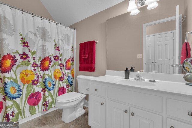 full bathroom with tile patterned flooring, toilet, vanity, lofted ceiling, and a shower with shower curtain