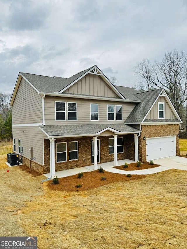 61 Observation Way, Dallas, GA 30132 - craftsman house featuring board and batten siding, roof with shingles, and concrete driveway