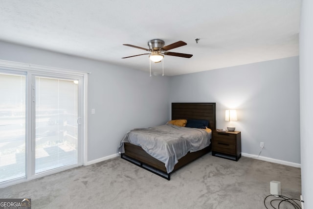 carpeted bedroom with baseboards, a ceiling fan, and access to outside