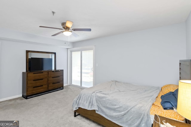 bedroom featuring baseboards, carpet floors, ceiling fan, and access to outside