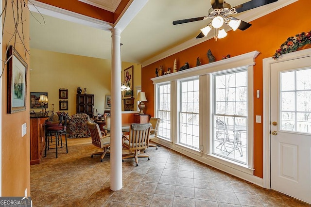 36 Blackthorn Ln, Colbert, GA 30628 - dining room with crown molding, ornate columns, a ceiling fan, tile patterned floors, and baseboards