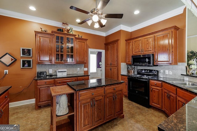 36 Blackthorn Ln, Colbert, GA 30628 - kitchen featuring black appliances, open shelves, a sink, light tile patterned flooring, and crown molding