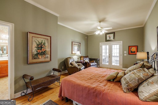36 Blackthorn Ln, Colbert, GA 30628 - bedroom featuring french doors, wood finished floors, baseboards, crown molding, and ceiling fan