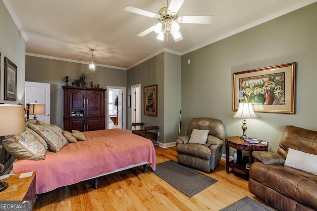 36 Blackthorn Ln, Colbert, GA 30628 - bedroom with light wood-type flooring, baseboards, ornamental molding, and ceiling fan