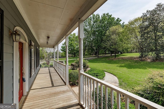 36 Blackthorn Ln, Colbert, GA 30628 - deck featuring covered porch and a yard