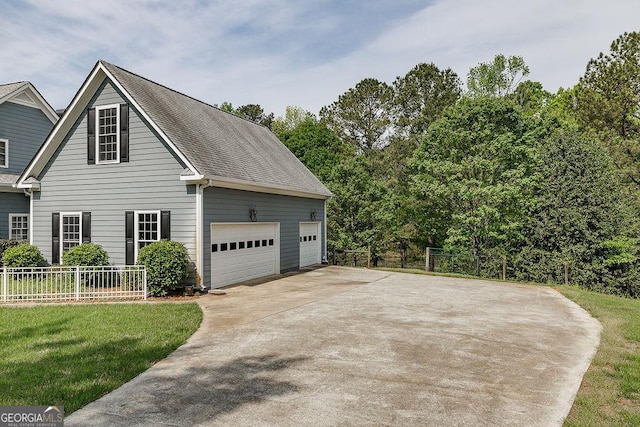 36 Blackthorn Ln, Colbert, GA 30628 - view of side of property featuring driveway and a garage