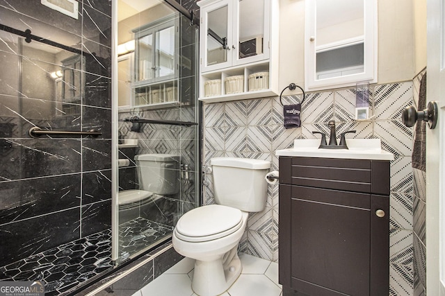 300 W Peachtree St Unit 21K, Atlanta, GA 30305 - full bath featuring a shower stall, vanity, tile patterned flooring, and tile walls