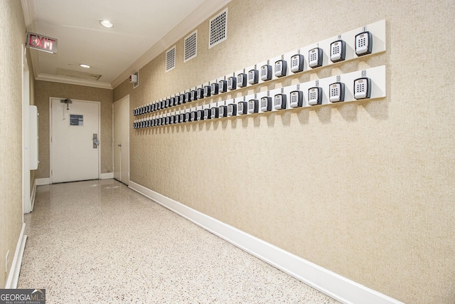 300 W Peachtree St Unit 21K, Atlanta, GA 30305 - hallway with crown molding, speckle patterned floor, and recessed lighting