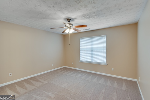 3024 Big Tree Rd, Gainesville, GA 30501 - unfurnished room with ceiling fan, light colored carpet, baseboards, and a textured ceiling