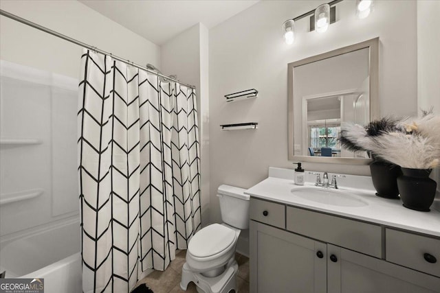 372 Garnet Dr, Acworth, GA 30101 - full bathroom featuring toilet, vanity, and shower / tub combo