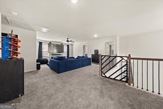372 Garnet Dr, Acworth, GA 30101 - living area with attic access, carpet floors, and a ceiling fan