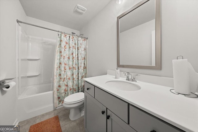 372 Garnet Dr, Acworth, GA 30101 - bathroom featuring toilet, shower / tub combo, vanity, and tile patterned flooring