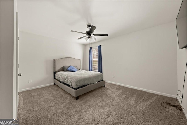372 Garnet Dr, Acworth, GA 30101 - carpeted bedroom with baseboards and a ceiling fan
