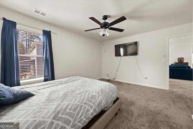 372 Garnet Dr, Acworth, GA 30101 - carpeted bedroom with baseboards and ceiling fan