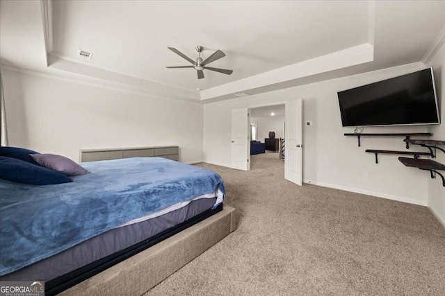372 Garnet Dr, Acworth, GA 30101 - bedroom with a tray ceiling, ornamental molding, carpet, baseboards, and a ceiling fan