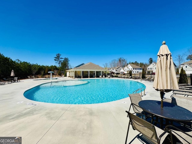 372 Garnet Dr, Acworth, GA 30101 - community pool featuring a patio and fence