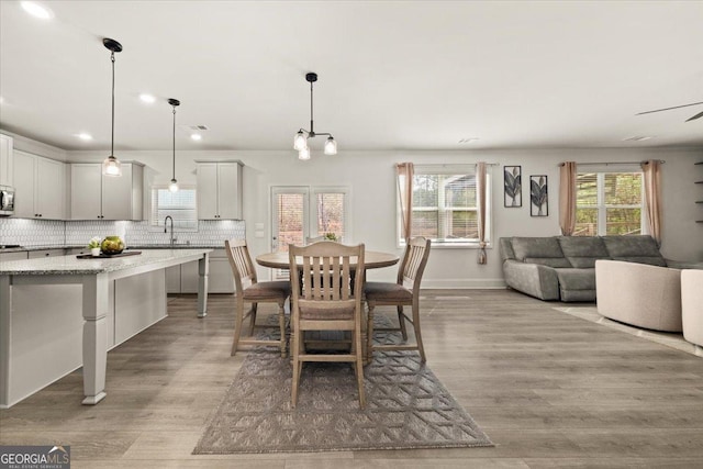 372 Garnet Dr, Acworth, GA 30101 - dining room with light wood finished floors, recessed lighting, and baseboards