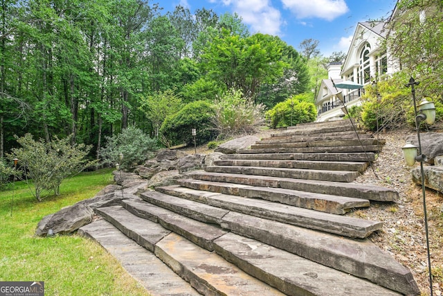 view of property's community with stairs