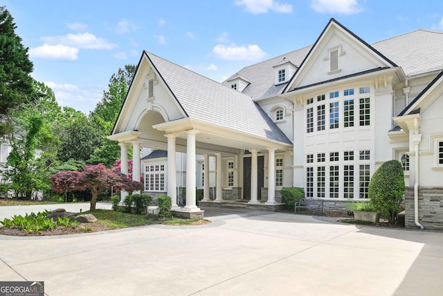 view of front of property with stucco siding and a porch