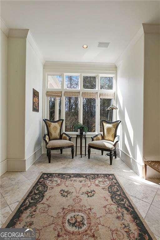 510 Covington Cv, Alpharetta, GA 30022 - sitting room with crown molding and baseboards