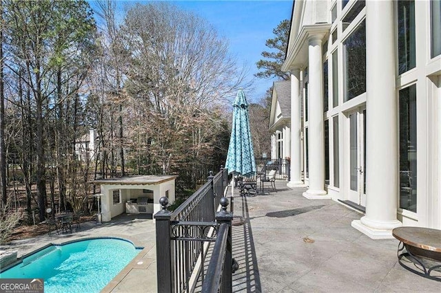 pool with a patio