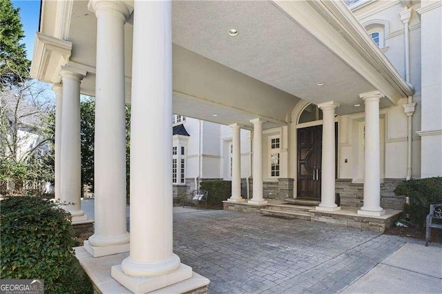 510 Covington Cv, Alpharetta, GA 30022 - doorway to property with a porch and stone siding