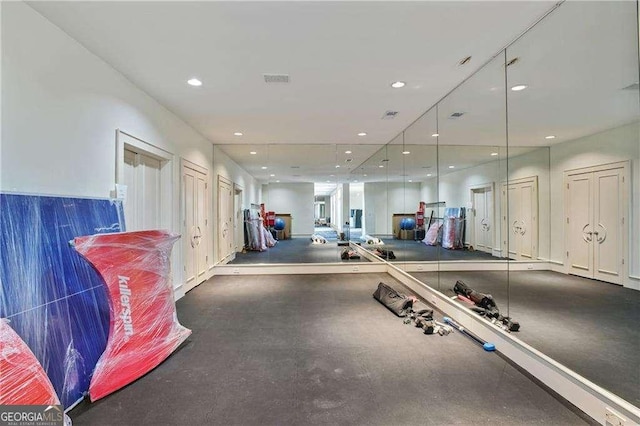 exercise area with recessed lighting and visible vents