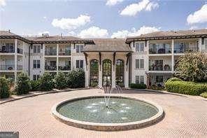 exterior space with curved driveway