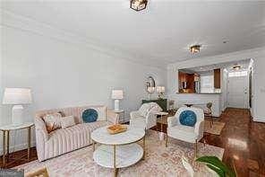 living room with wood finished floors