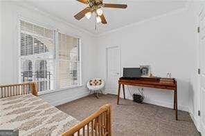 bedroom featuring crown molding