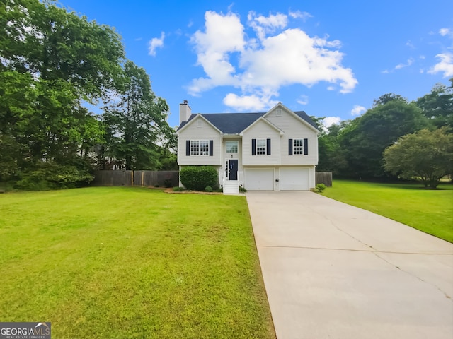 10 Jasmine Ln SW, Euharlee, GA 30120 - raised ranch with a garage, driveway, and a chimney