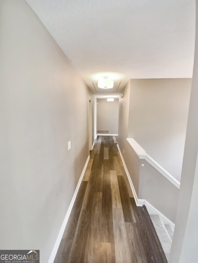10 Jasmine Ln SW, Euharlee, GA 30120 - hall with attic access, wood finished floors, and baseboards