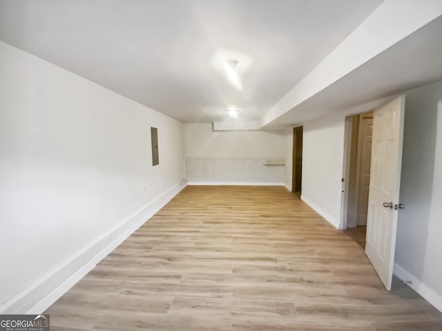 10 Jasmine Ln SW, Euharlee, GA 30120 - finished basement with electric panel, light wood-style flooring, and baseboards
