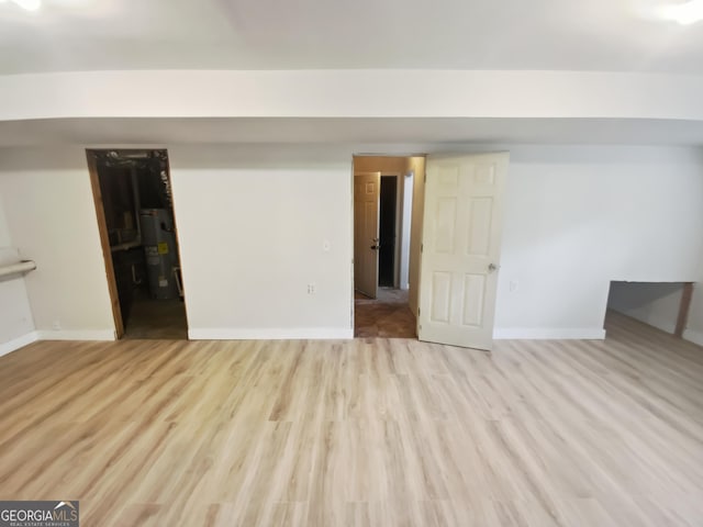10 Jasmine Ln SW, Euharlee, GA 30120 - finished below grade area featuring water heater, wood finished floors, and baseboards