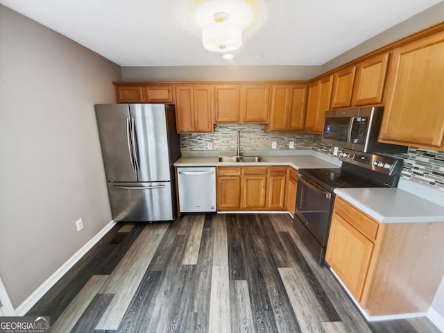 10 Jasmine Ln SW, Euharlee, GA 30120 - kitchen featuring stainless steel appliances, a sink, dark wood finished floors, light countertops, and backsplash