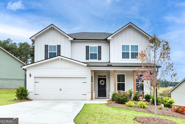 119 Peachwood Ln, Homer, GA 30547 - traditional-style house featuring board and batten siding, driveway, a porch, and a front lawn