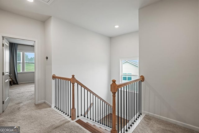 stairway with baseboards, carpet flooring, and recessed lighting