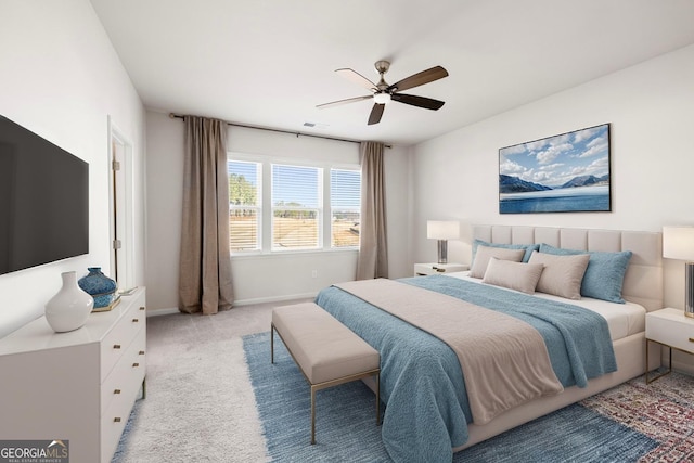119 Peachwood Ln, Homer, GA 30547 - bedroom featuring light colored carpet, visible vents, baseboards, and ceiling fan