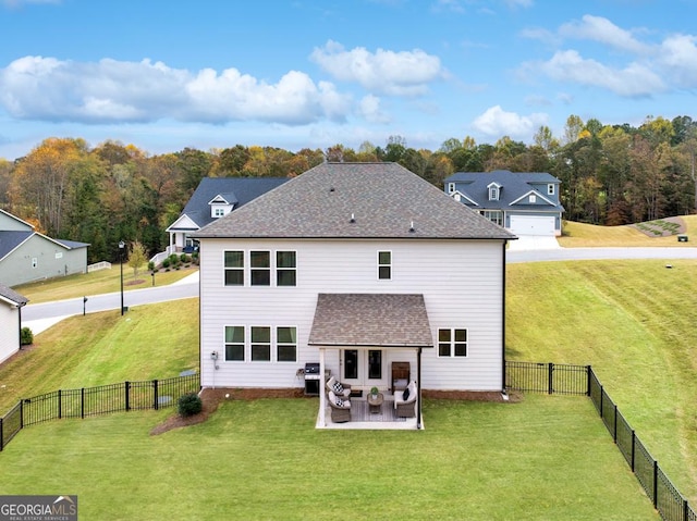 119 Peachwood Ln, Homer, GA 30547 - back of property featuring a yard, roof with shingles, and a fenced backyard