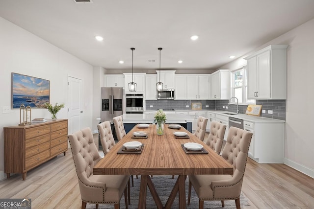 119 Peachwood Ln, Homer, GA 30547 - dining area with light wood finished floors, baseboards, and recessed lighting