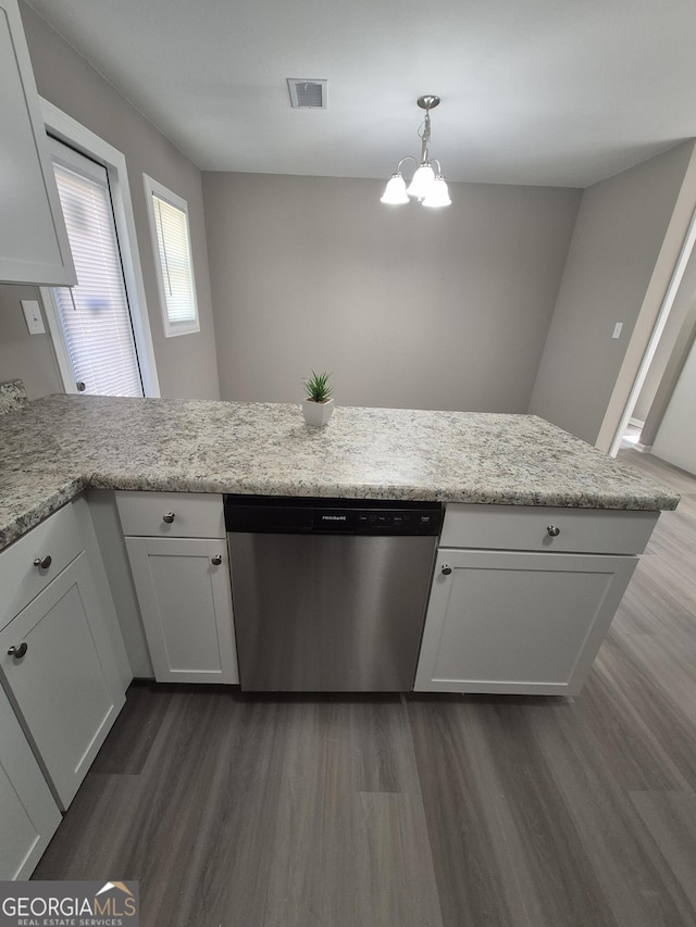 130 Royal Ct, Athens, GA 30601 - kitchen with stainless steel dishwasher, dark wood-type flooring, a chandelier, white cabinets, and a peninsula