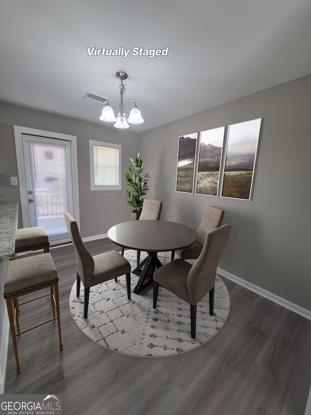 130 Royal Ct, Athens, GA 30601 - dining area featuring a chandelier and wood finished floors