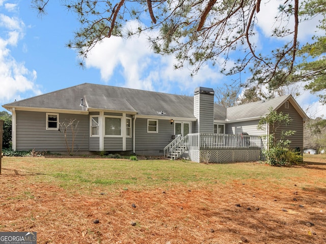 230 Acorn Ct, Mcdonough, GA 30253 - rear view of property with a garage, a deck, a yard, and a chimney