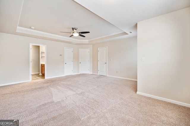 249 Madison Ave, Acworth, GA 30102 - unfurnished bedroom featuring ensuite bath, baseboards, light carpet, and a raised ceiling